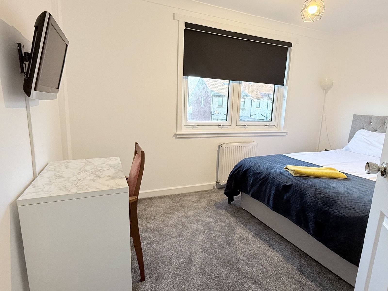 Twilight Room — super-king bed with a work-from-home desk and TV